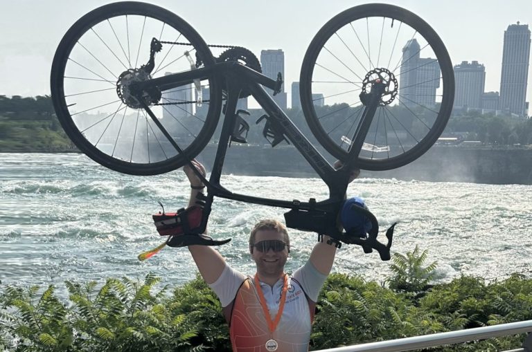 From two wings to two wheels: air broker’s staff raise $200K for charity